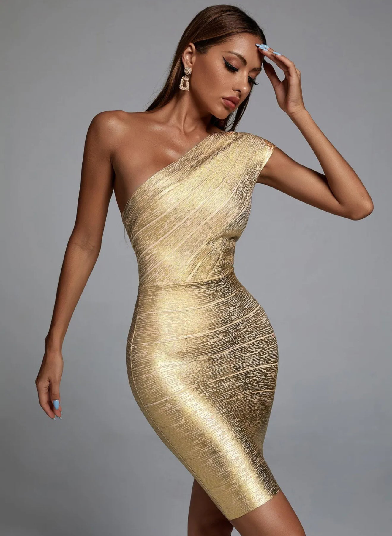 One shoulder gold dress
