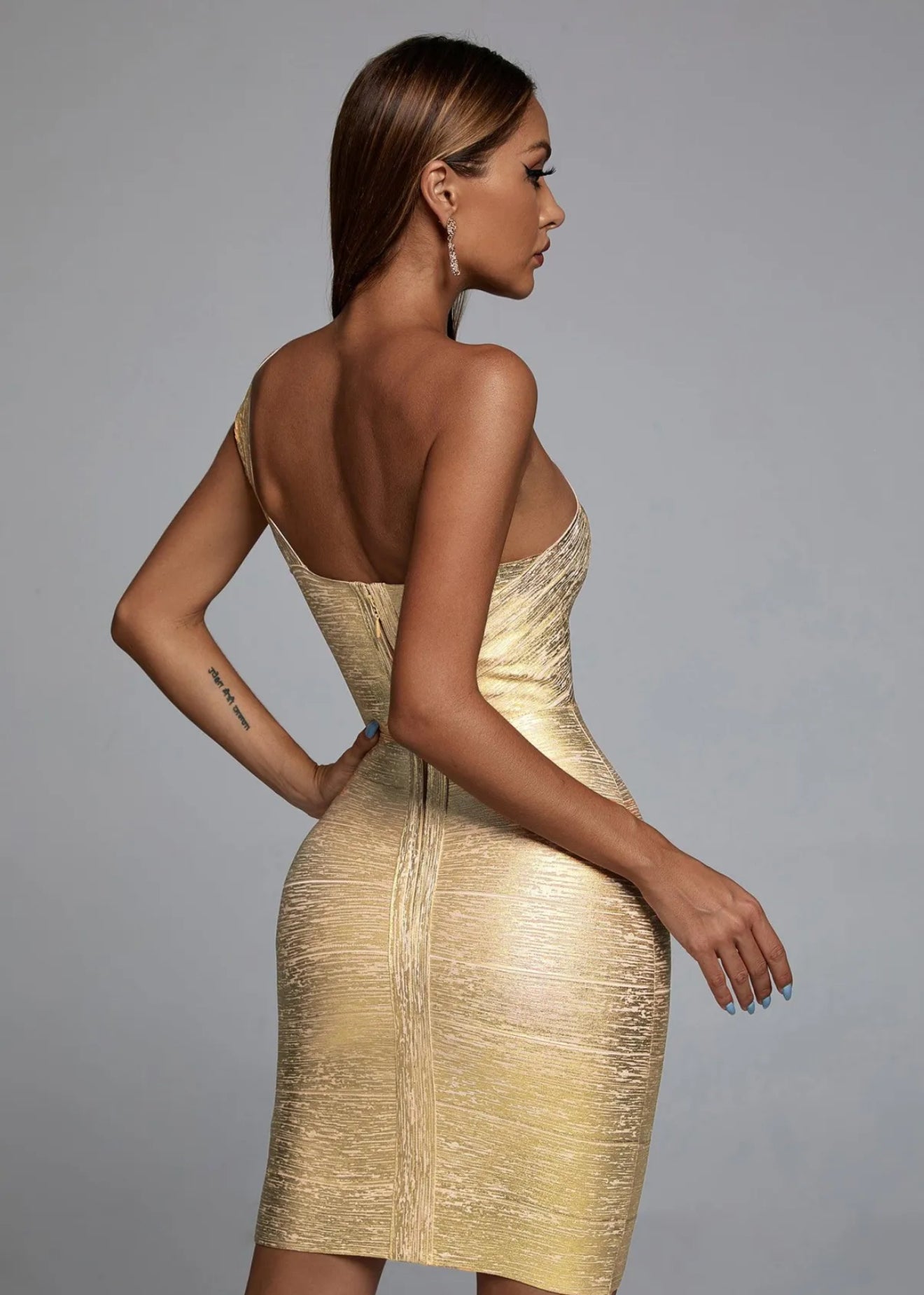 One shoulder gold dress