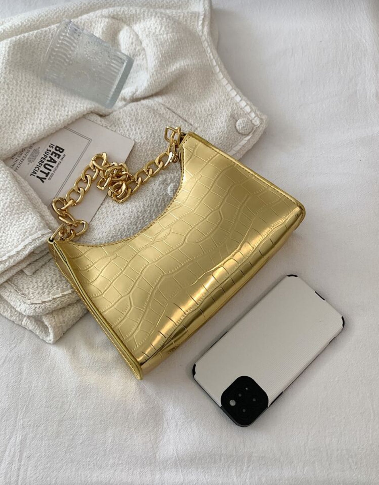 Embossed Baguette Gold Bag