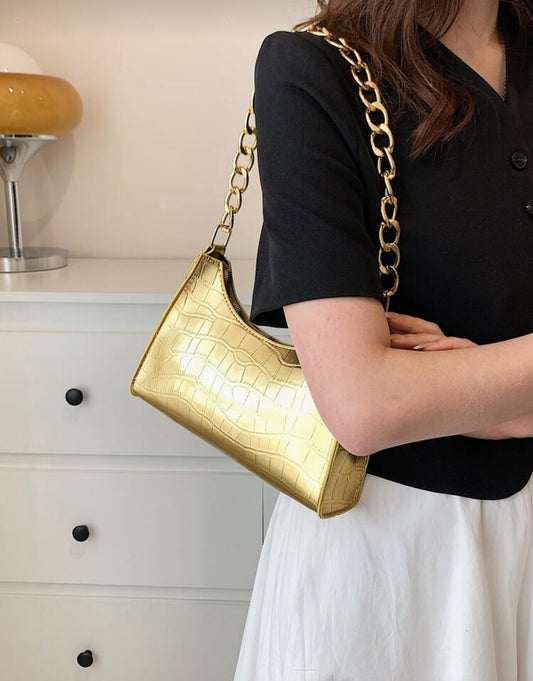 Embossed Baguette Gold Bag
