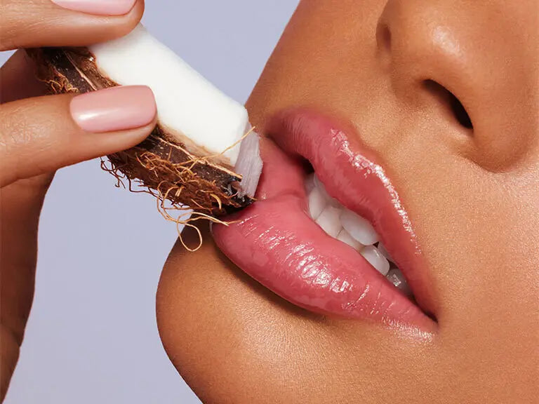 POLITE SOCIETY Color Coconut Cream
Polite Pout Glossy Lip Balm in Peach Bellini